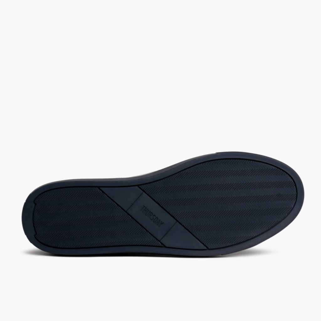 High-Traction Rubber Outsole & Lug Tread Pattern on Encore Navy Leather Sneakers