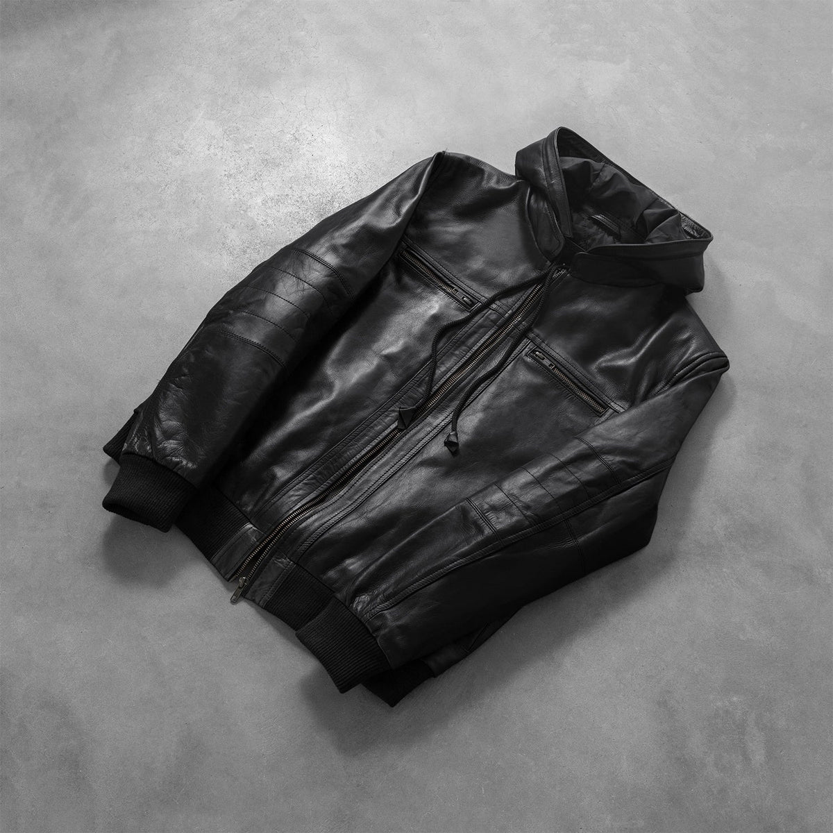 
Rib knit & Hem Craftsmanship Construction Detail on Bouncer Biz Black Leather Hooded Bomber Jacket