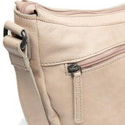 
Solid Antique Brass Hardware & Heavy-Duty Dual Zipper Detail on Clarita Кожаная сумка-кроссбоди