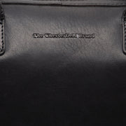 Close-Up Detail of Classic Collar &amp; Heavy-Duty Zipper Hardware on Langton Full-Grain Leather Handbag