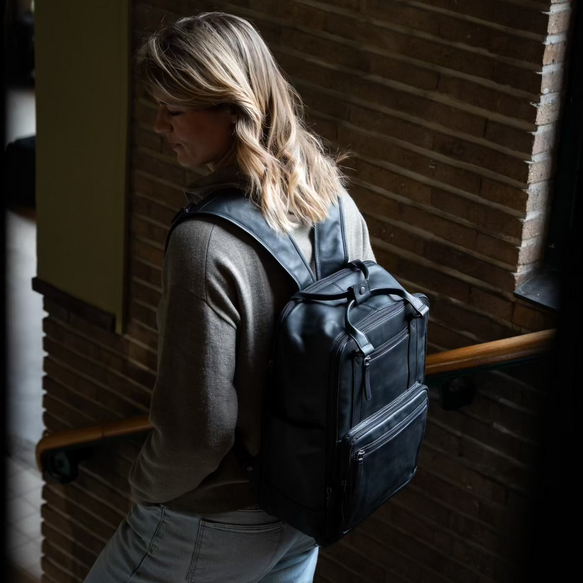 Calden Full-Grain Leather Laptop Backpack - Structured Side Profile Showing Gusset Depth &amp; Expansion Capacity