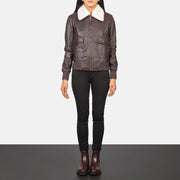 
Stella G-1 Maroon Leather Bomber Jacket - Вид сбоку, демонстрирующий эргономичный крой рукава