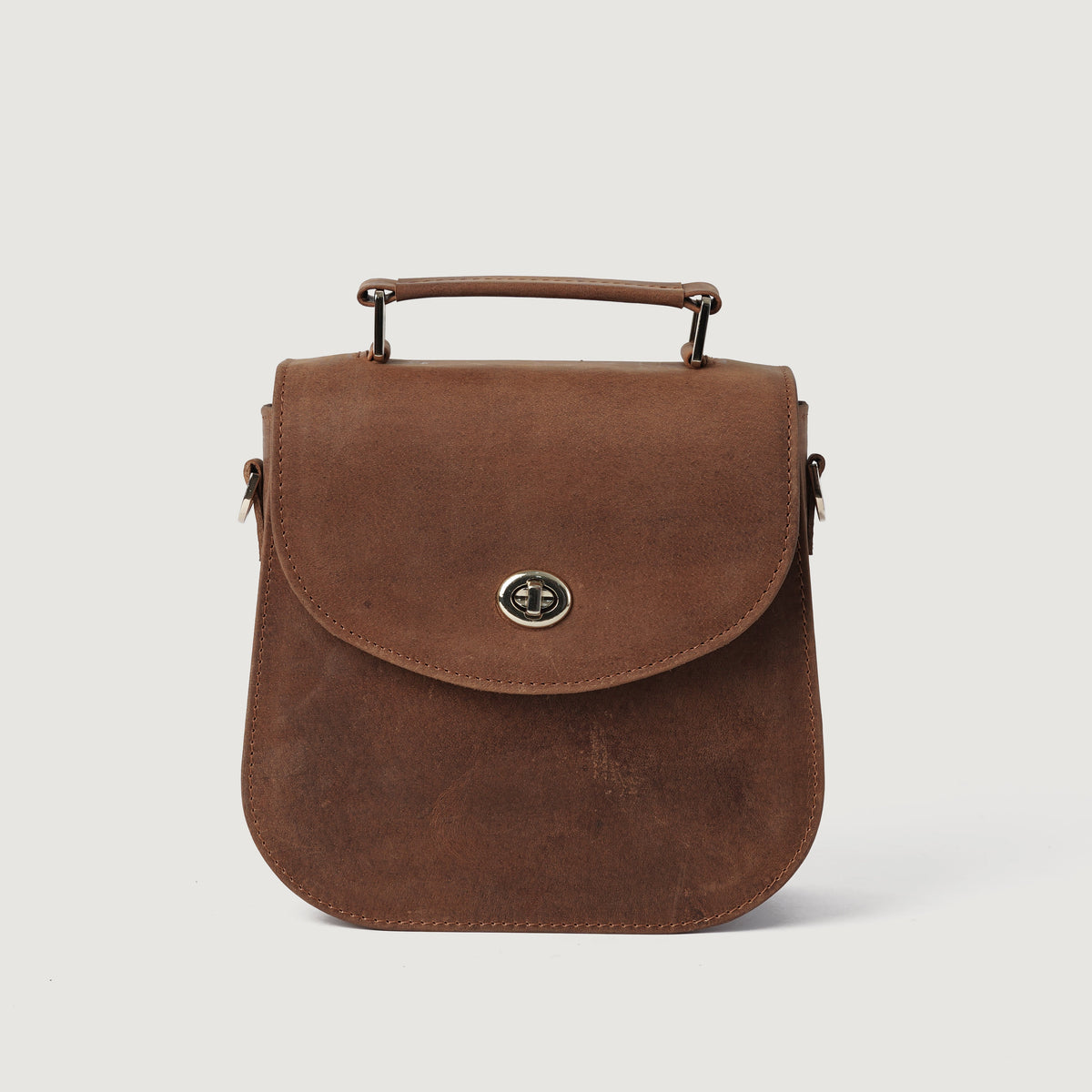 
The Sandra Vintage Рыжий Leather Saddle Bag For Women - Боковой профиль с глубиной складок и вместительностью