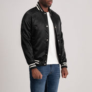 
Black Satin Varsity Jacket - Вид сзади, подчеркивающий посадку по плечам и ровный край